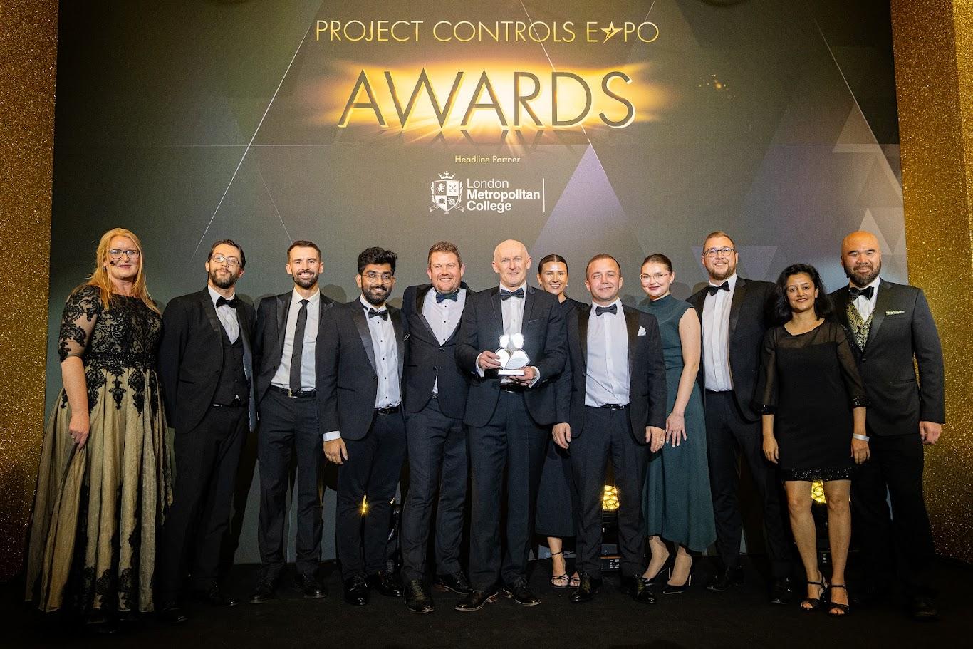 An image of D2 staff accepting project controls expo sme of the year 2024